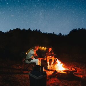 Stargazing next to the campfire.