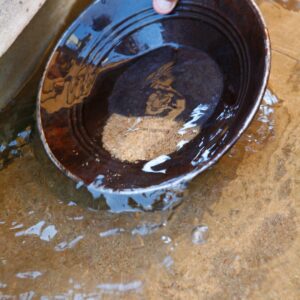 Someone panning for gold