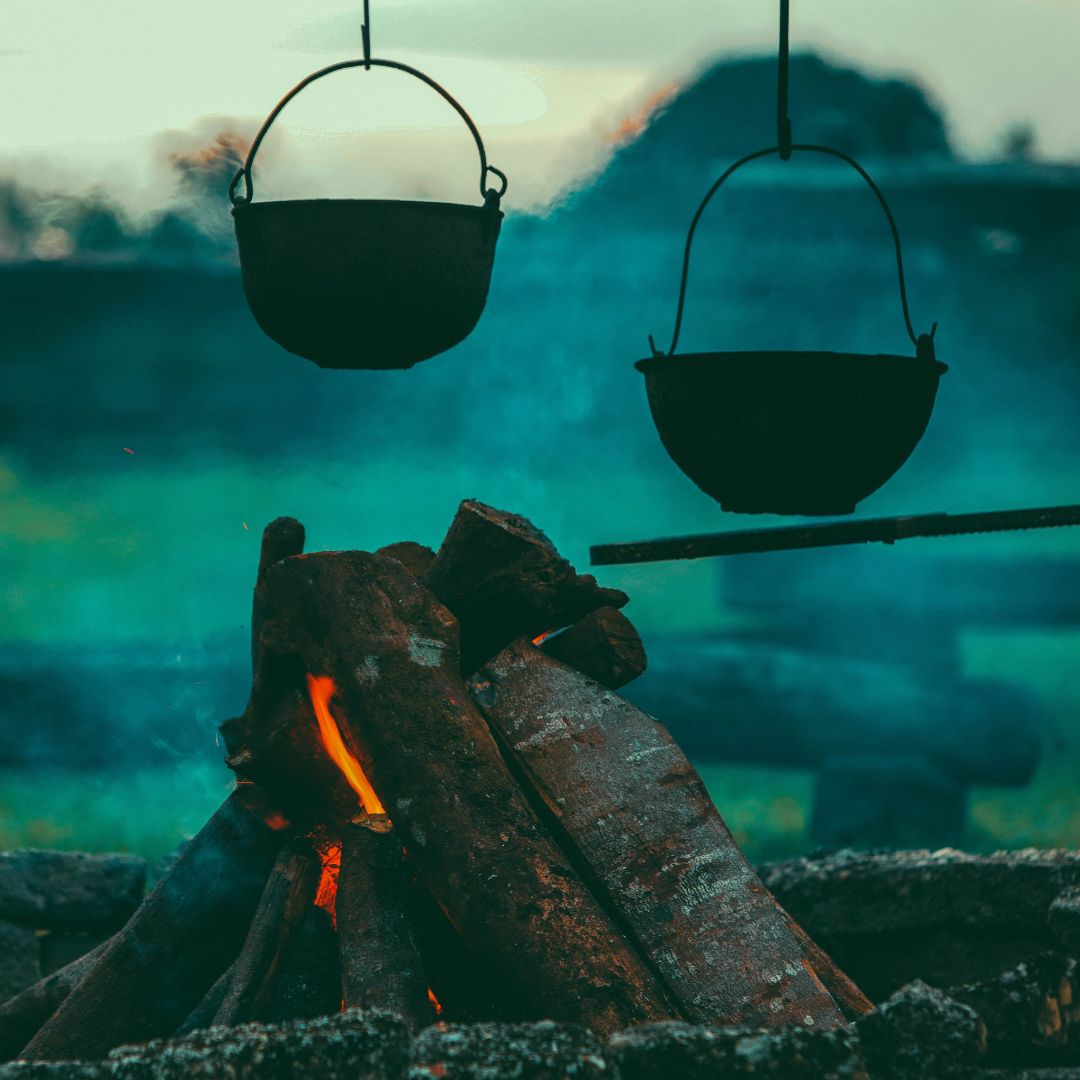 pots over a campfire