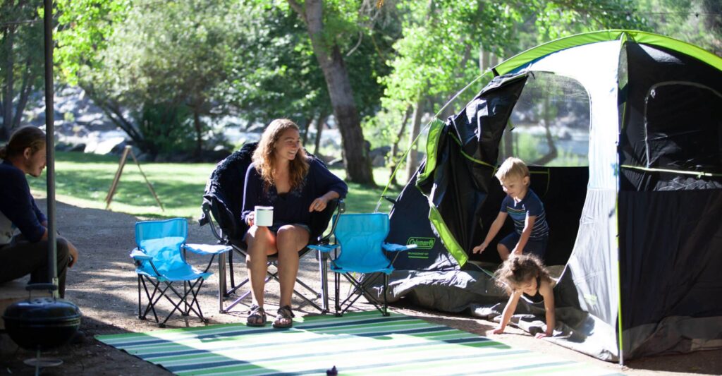 a family having fun at a camp site