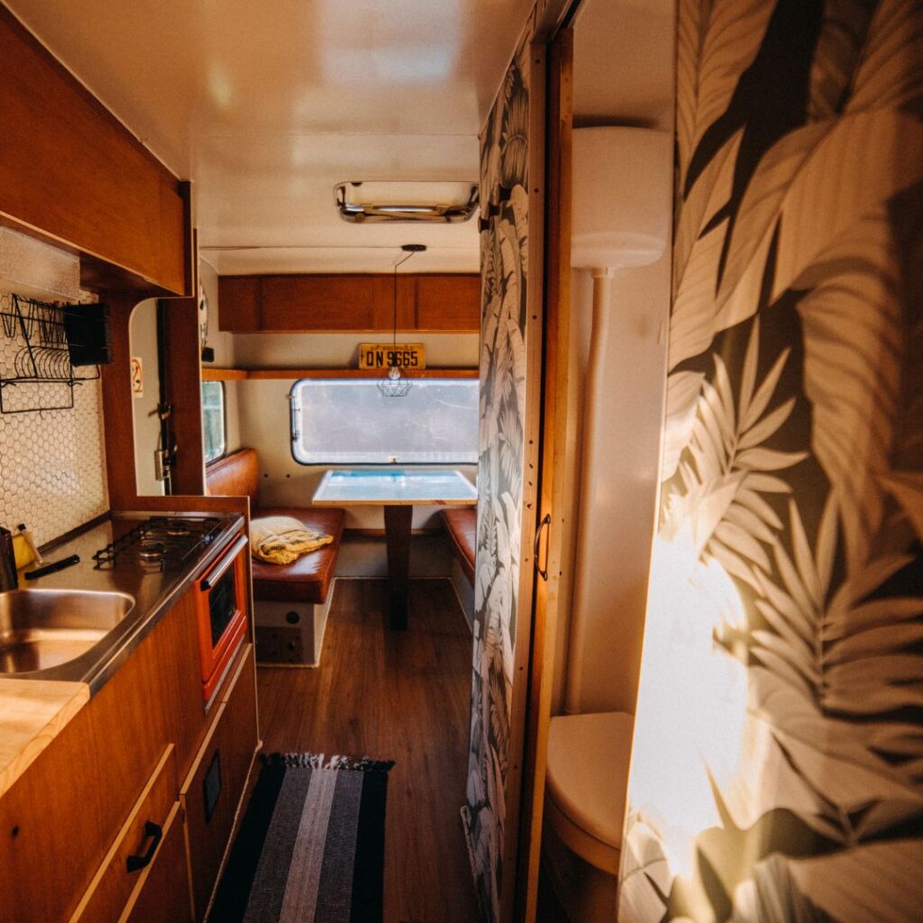 RV interior with palm leaf curtains