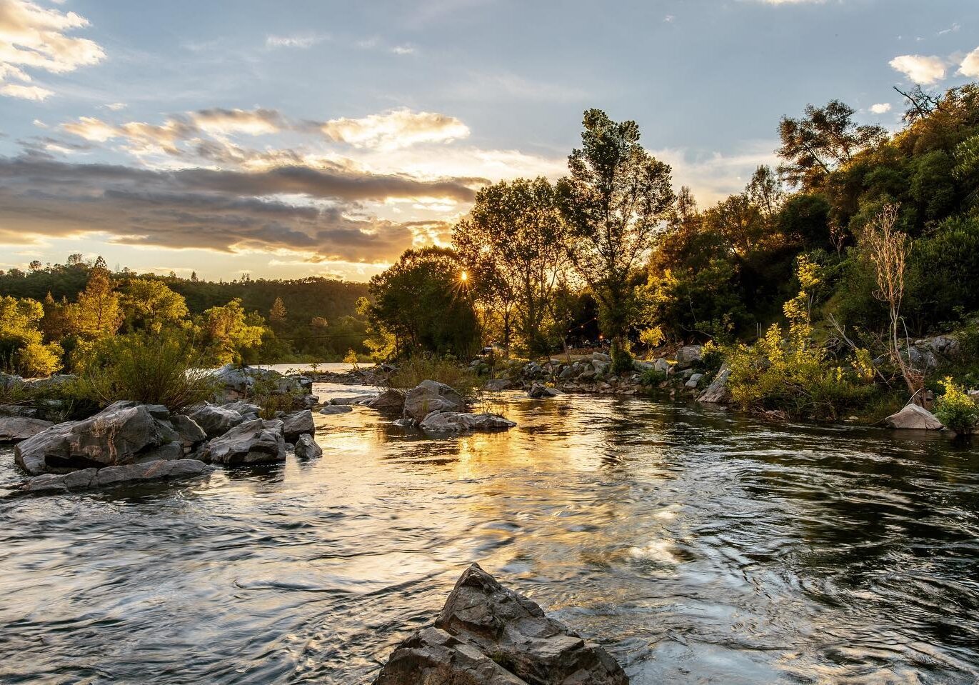 Camping by the river at coloma resorts sunset view